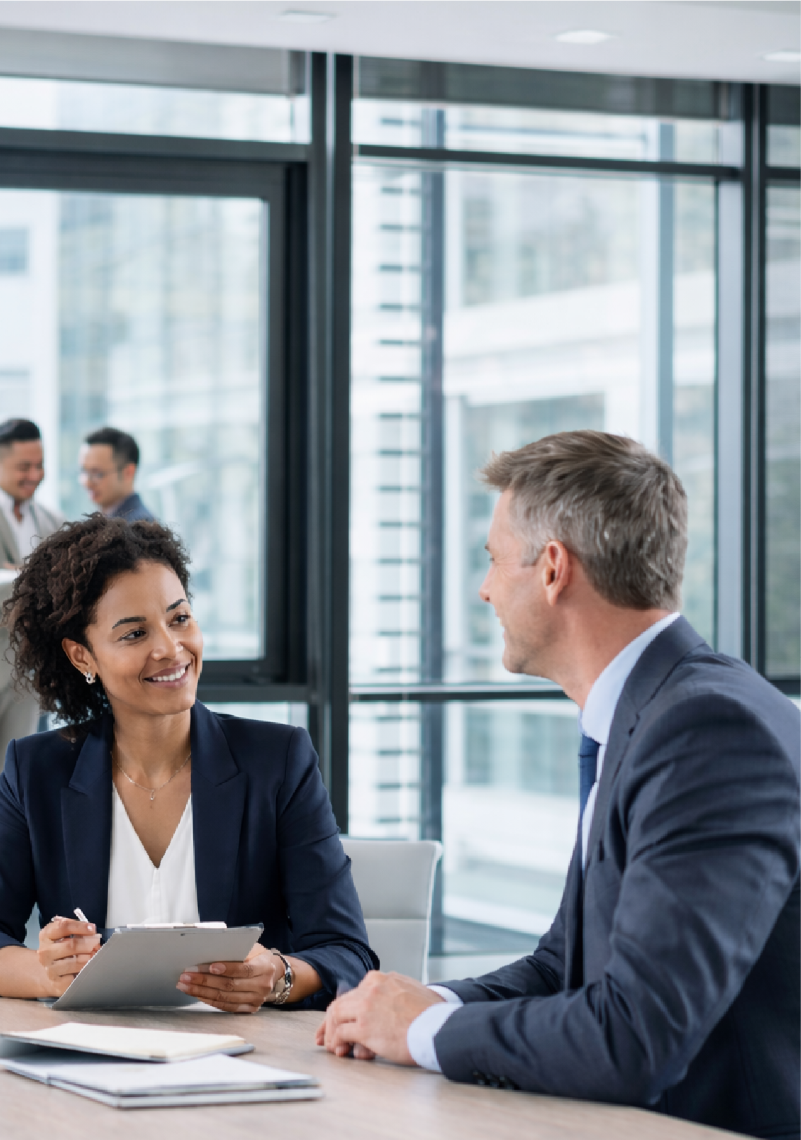 Professional discussing an accident case with a client during a consultation in a Chicago office.